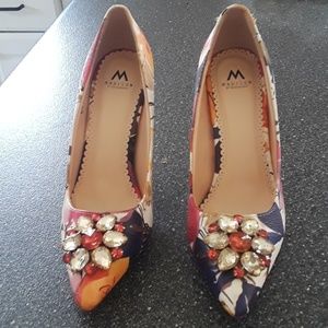 3 inch floral pumps.   Never worn.